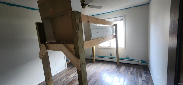 5002 Canterbury Dr, Fort Wayne, IN 46835 - unfurnished bedroom with a baseboard radiator and wood finished floors