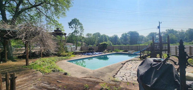 5002 Canterbury Dr, Fort Wayne, IN 46835 - view of pool with a fenced backyard, a wooden deck, and a patio area