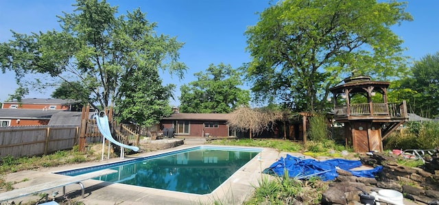5002 Canterbury Dr, Fort Wayne, IN 46835 - view of swimming pool featuring a water slide and a diving board