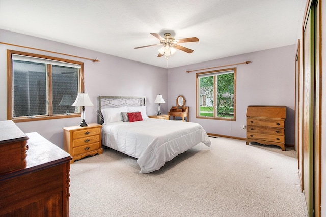 1358 Penny Ln, Nappanee, IN 46550 - carpeted bedroom featuring ceiling fan and baseboards