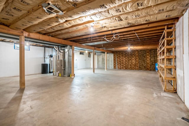 18363 Sheffield Ln, Bristol, IN 46507 - unfinished below grade area featuring heating unit and washer / clothes dryer