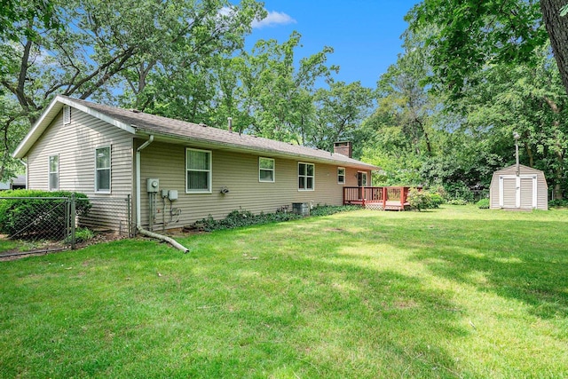 18363 Sheffield Ln, Bristol, IN 46507 - rear view of property with a wooden deck and a chimney