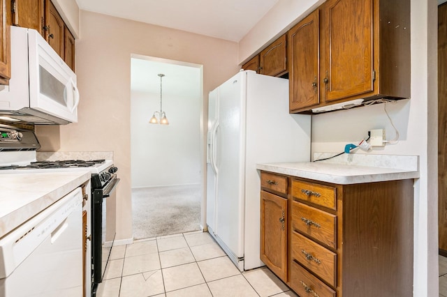 18363 Sheffield Ln, Bristol, IN 46507 - kitchen featuring white appliances, brown cabinetry, light countertops, and light carpet