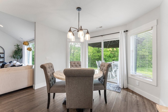 16995 Hatstick Ct, Fort Wayne, IN 46845 - dining area featuring a chandelier, healthy amount of natural light, and wood finished floors