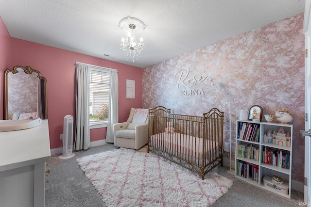 16995 Hatstick Ct, Fort Wayne, IN 46845 - bedroom with carpet, a chandelier, a nursery area, a textured ceiling, and baseboards