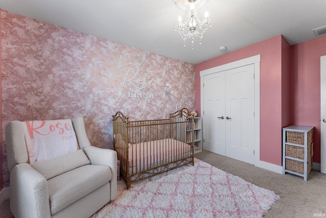 16995 Hatstick Ct, Fort Wayne, IN 46845 - bedroom featuring carpet floors, a closet, a chandelier, baseboards, and wallpapered walls
