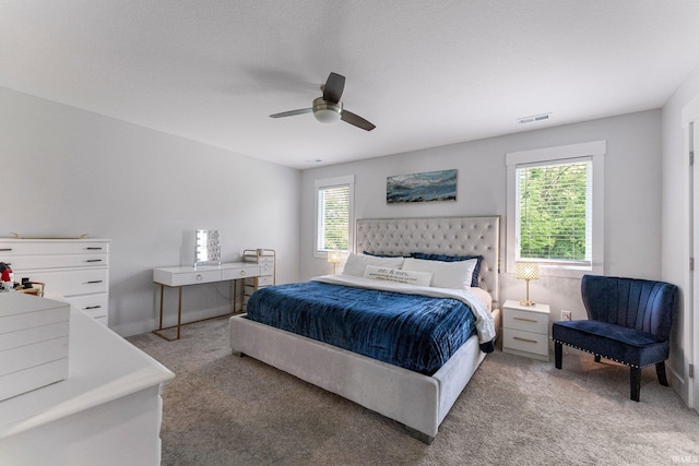 16995 Hatstick Ct, Fort Wayne, IN 46845 - carpeted bedroom featuring multiple windows and a ceiling fan