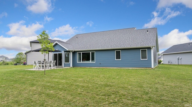 16995 Hatstick Ct, Fort Wayne, IN 46845 - back of house featuring a yard, roof with shingles, and a patio area