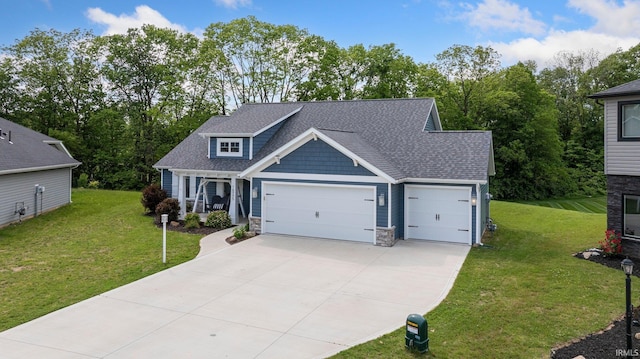 16995 Hatstick Ct, Fort Wayne, IN 46845 - craftsman house with a front lawn, a garage, driveway, and a shingled roof