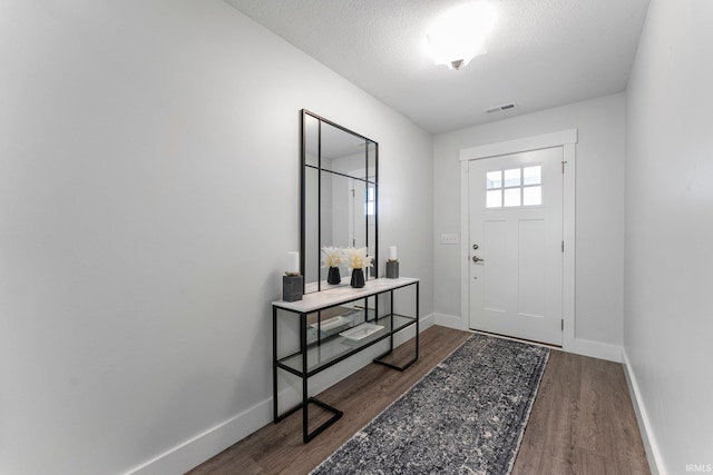 16995 Hatstick Ct, Fort Wayne, IN 46845 - entrance foyer with wood finished floors and baseboards