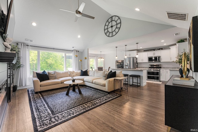 16995 Hatstick Ct, Fort Wayne, IN 46845 - living area with high vaulted ceiling, ceiling fan, dark wood-style floors, and recessed lighting
