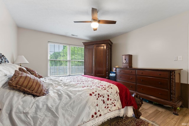5405 N Andrea Dr, Bloomington, IN 47404 - bedroom with wood finished floors and a ceiling fan