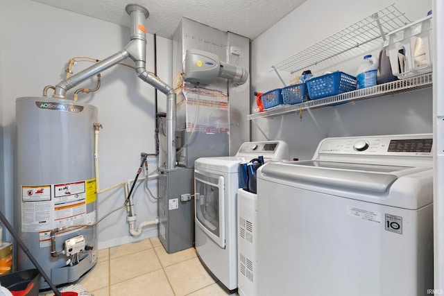 5405 N Andrea Dr, Bloomington, IN 47404 - laundry room with gas water heater, separate washer and dryer, tile patterned flooring, and a textured ceiling