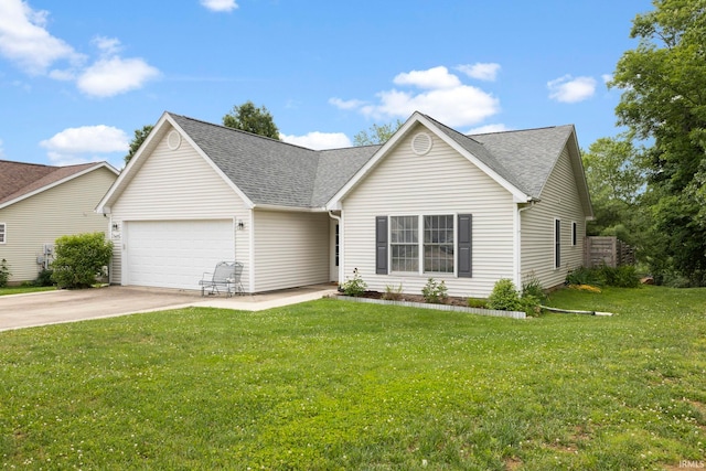 5405 N Andrea Dr, Bloomington, IN 47404 - view of front facade featuring a garage, a shingled roof, driveway, and a front yard