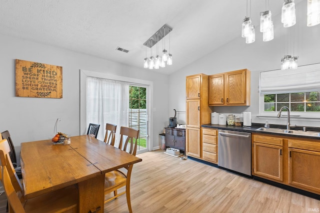 5405 N Andrea Dr, Bloomington, IN 47404 - dining room with light wood-style flooring, vaulted ceiling, and a chandelier