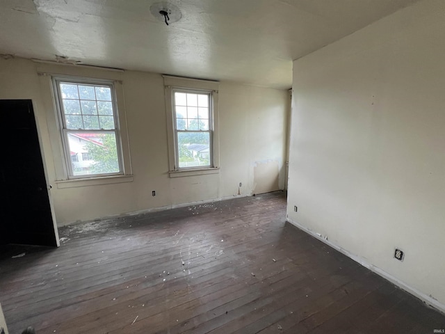 102 W Hackett St, Carlisle, IN 47838 - spare room with hardwood / wood-style flooring