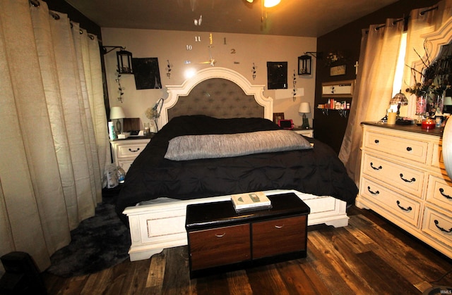 102 E Howard St, Galveston, IN 46932 - bedroom with dark wood finished floors