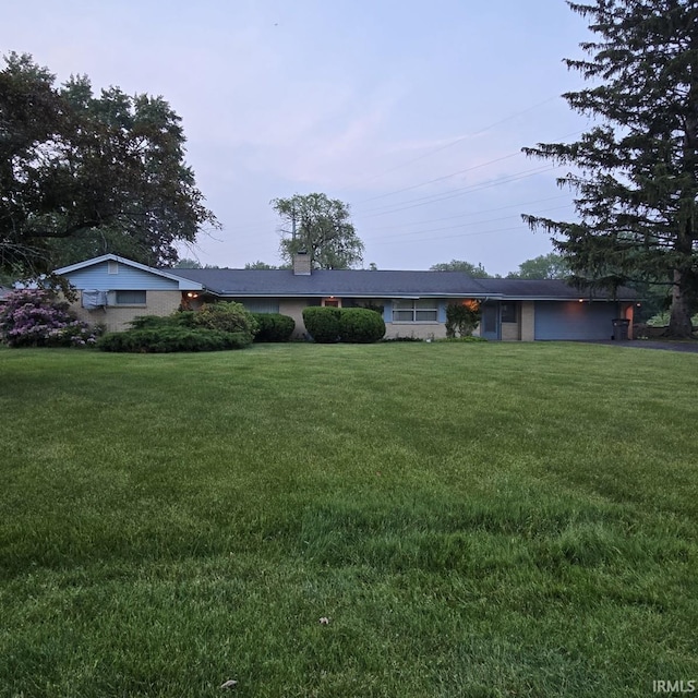 17295 Willowbrook St, South Bend, IN 46635 - single story home featuring a front lawn and a chimney