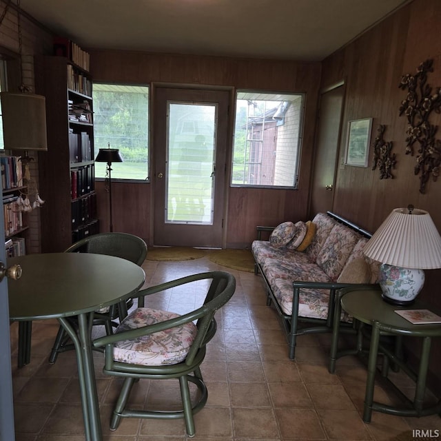 17295 Willowbrook St, South Bend, IN 46635 - living room featuring wood walls and healthy amount of natural light