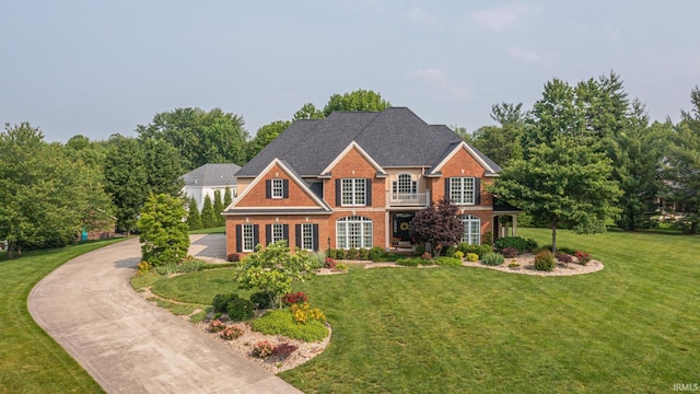 3 Brownstone Ct, Jasper, IN 47546 - georgian-style home featuring brick siding and a front yard
