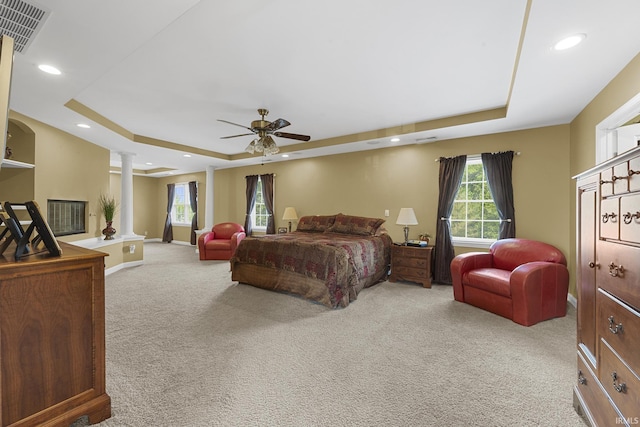 3 Brownstone Ct, Jasper, IN 47546 - bedroom featuring a tray ceiling, ornate columns, carpet, recessed lighting, and baseboards