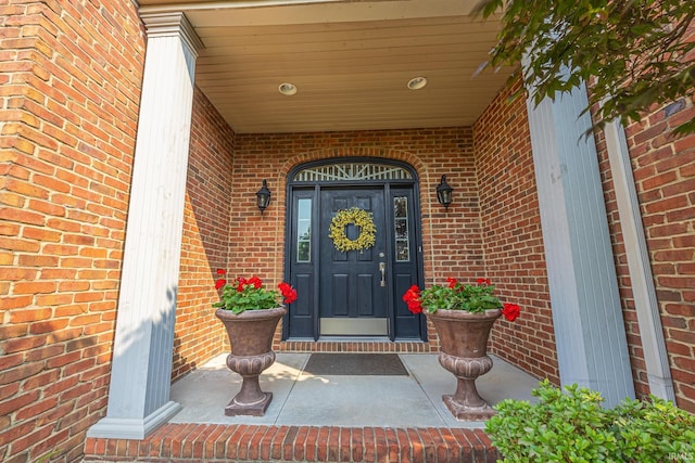 3 Brownstone Ct, Jasper, IN 47546 - entrance to property featuring a porch and brick siding