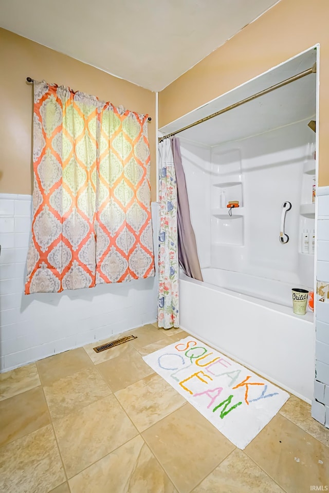 6613 E Hickory Ln, Muncie, IN 47303 - full bath with shower / bath combo and tile patterned flooring