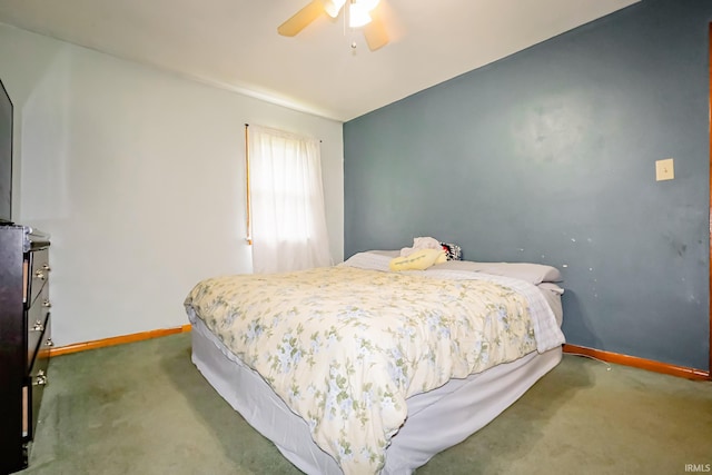 6613 E Hickory Ln, Muncie, IN 47303 - carpeted bedroom with baseboards and ceiling fan