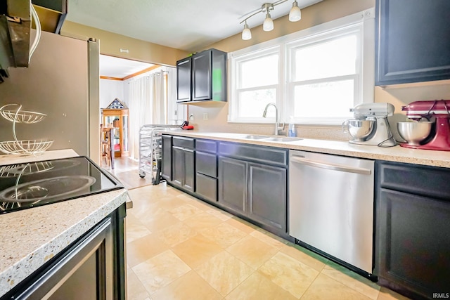 6613 E Hickory Ln, Muncie, IN 47303 - kitchen featuring dishwasher, a sink, light countertops, and electric range oven