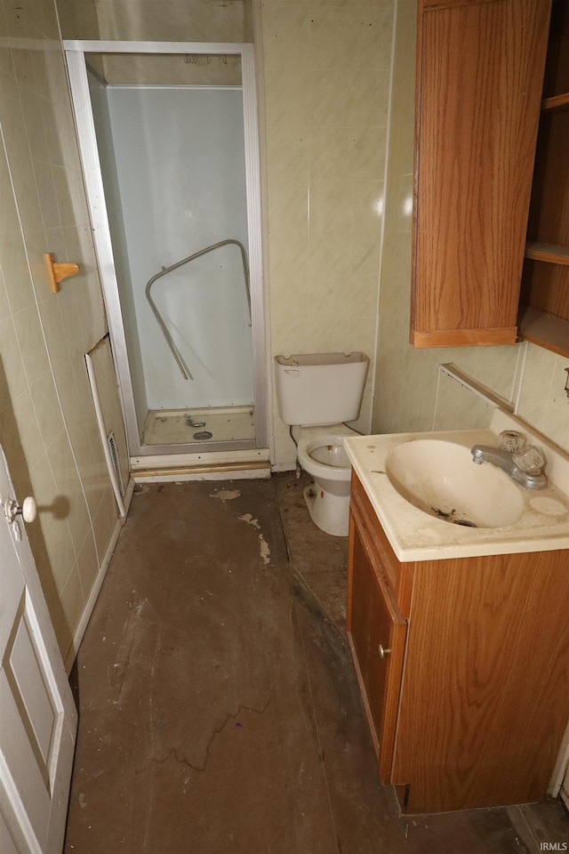 744 First St, Huntington, IN 46750 - full bath with vanity, a stall shower, toilet, and unfinished concrete floors