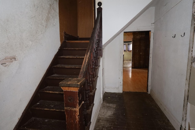 744 First St, Huntington, IN 46750 - staircase featuring wood finished floors