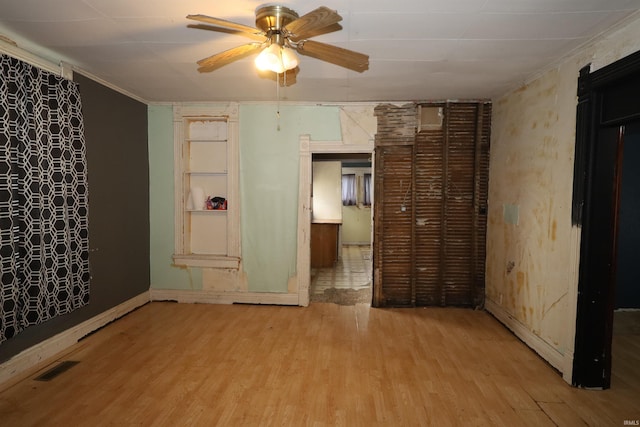 744 First St, Huntington, IN 46750 - unfurnished bedroom featuring wood finished floors and baseboards