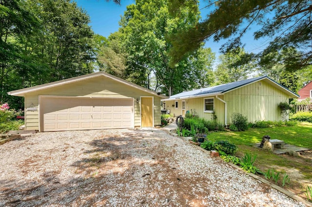 6521 Snug Harbour Ln, Unionville, IN 47468 - ranch-style home featuring an outdoor structure and a detached garage