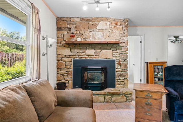 6521 Snug Harbour Ln, Unionville, IN 47468 - living area with ornamental molding, healthy amount of natural light, and a ceiling fan