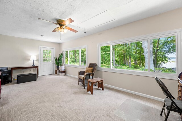 6521 Snug Harbour Ln, Unionville, IN 47468 - sitting room with ceiling fan, a desk, baseboards, and carpet