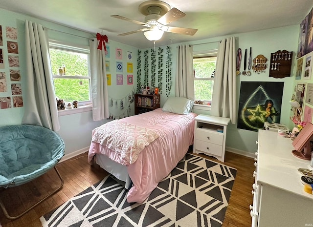 302 S Edgewood Dr, Ellettsville, IN 47429 - bedroom featuring dark wood-style floors, baseboards, and a ceiling fan