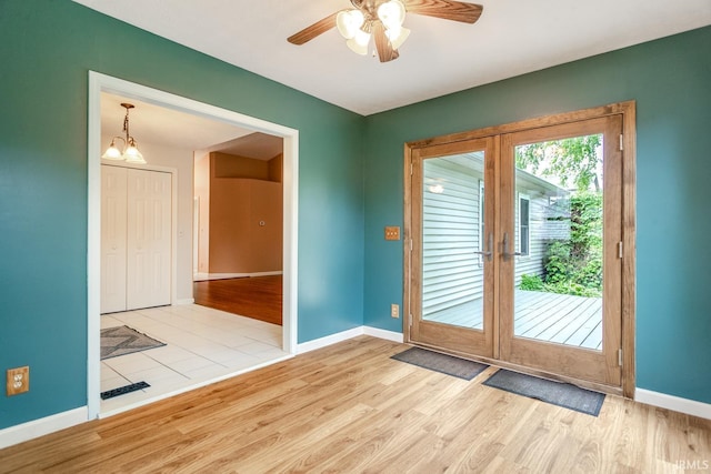 4331 Hadley Ct, West Lafayette, IN 47906 - doorway to outside with wood finished floors, baseboards, and a ceiling fan