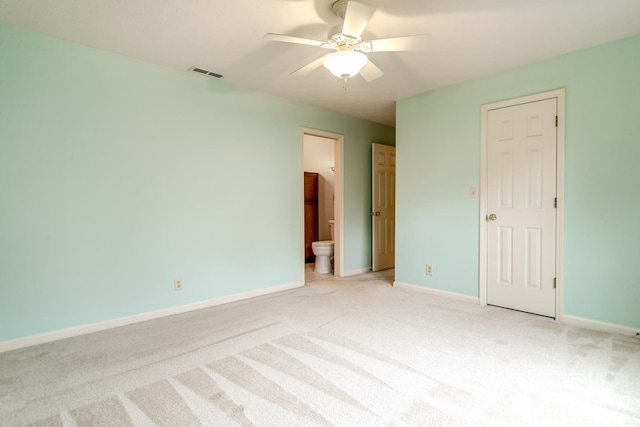4331 Hadley Ct, West Lafayette, IN 47906 - unfurnished bedroom with light carpet, baseboards, connected bathroom, and a ceiling fan