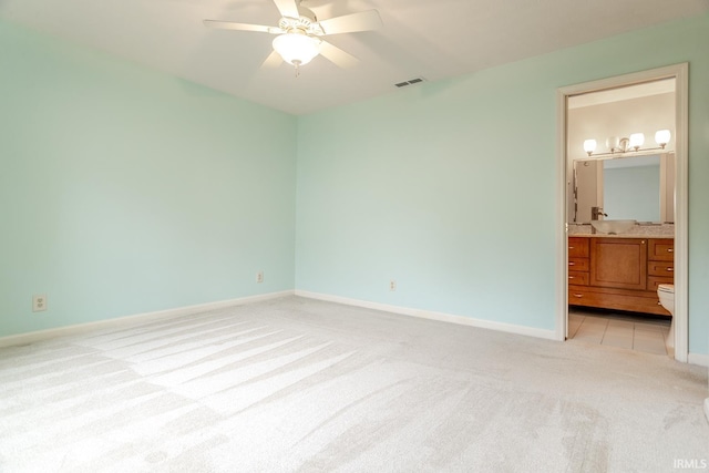 4331 Hadley Ct, West Lafayette, IN 47906 - unfurnished bedroom featuring light carpet, baseboards, ensuite bath, and ceiling fan