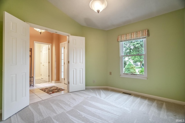 4331 Hadley Ct, West Lafayette, IN 47906 - unfurnished bedroom featuring carpet flooring, baseboards, and tile patterned flooring