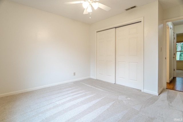 4331 Hadley Ct, West Lafayette, IN 47906 - unfurnished bedroom featuring light colored carpet, baseboards, a closet, and a ceiling fan