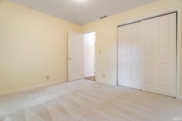 4331 Hadley Ct, West Lafayette, IN 47906 - unfurnished bedroom featuring light carpet, a closet, and baseboards