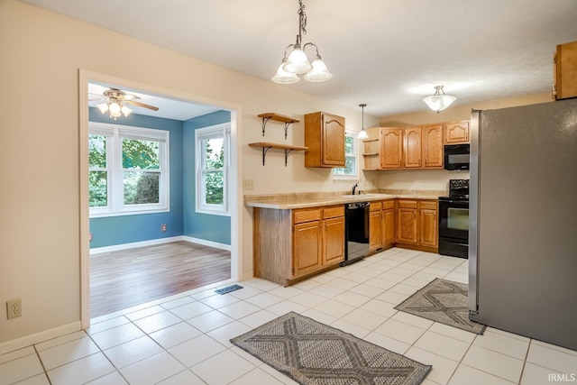 4331 Hadley Ct, West Lafayette, IN 47906 - kitchen with black appliances, open shelves, light countertops, a sink, and hanging light fixtures