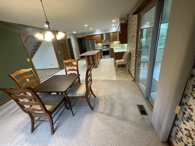 404 Ridge Ct, Ossian, IN 46777 - dining room featuring healthy amount of natural light, baseboards, and recessed lighting