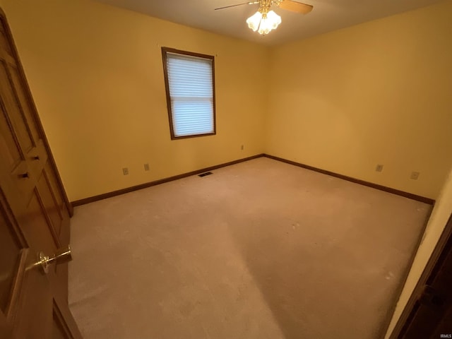 404 Ridge Ct, Ossian, IN 46777 - unfurnished bedroom with carpet floors, baseboards, and a ceiling fan