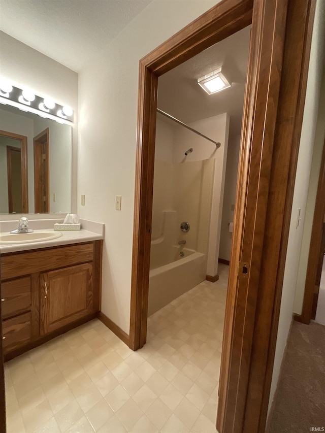 404 Ridge Ct, Ossian, IN 46777 - full bath with vanity, bathing tub / shower combination, and baseboards