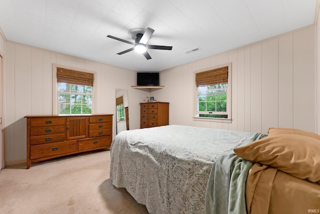 2905 E Mowrey Rd, Columbia City, IN 46725 - bedroom with light colored carpet, multiple windows, and ceiling fan