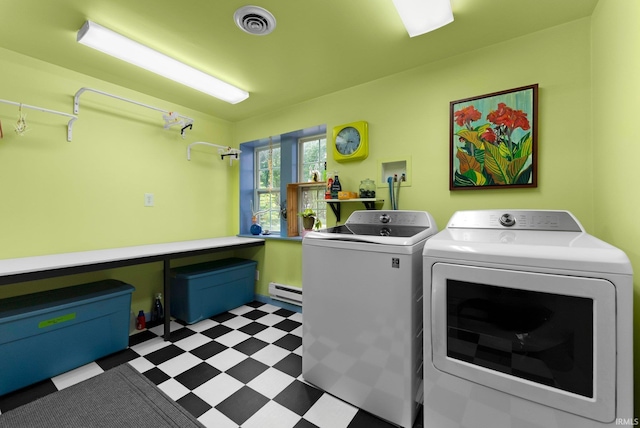 2905 E Mowrey Rd, Columbia City, IN 46725 - washroom featuring tile patterned floors, separate washer and dryer, and a baseboard heating unit