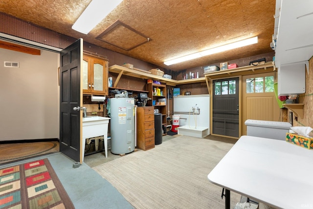 2905 E Mowrey Rd, Columbia City, IN 46725 - basement featuring electric water heater and a sink