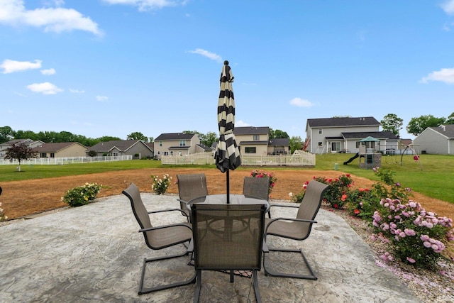 2082 Hemlock Ln, Warsaw, IN 46580 - view of patio / terrace with a playground, outdoor dining area, and a residential view